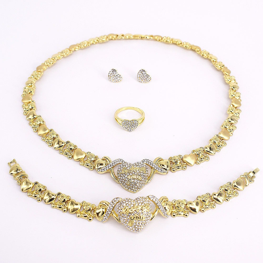 Conjunto de joyería de corazón dorado con amor