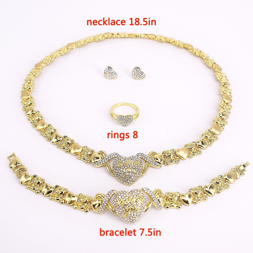 Conjunto de joyería de corazón dorado con amor