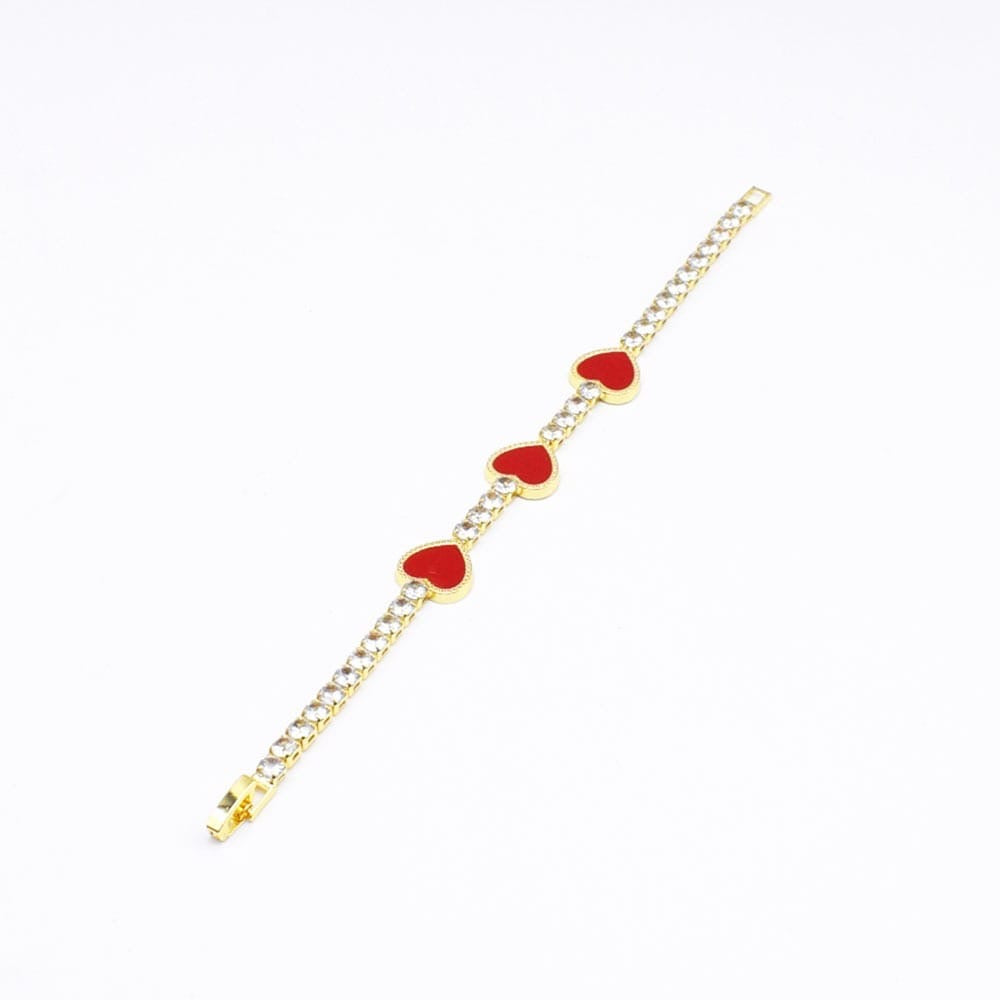 Pulsera con dije de corazón dorado
