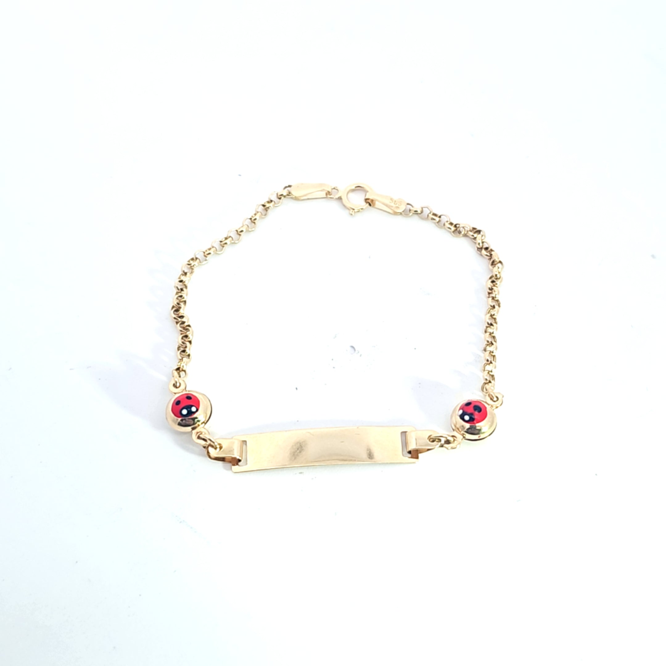 Pulsera de bebé con forma de mariquita de oro de 14k